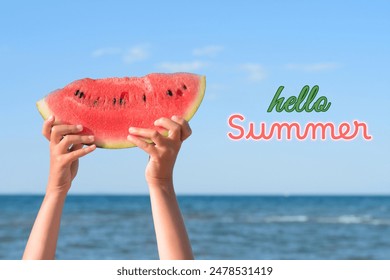 Hello Summer. Child holding watermelon slice near ocean, closeup - Powered by Shutterstock