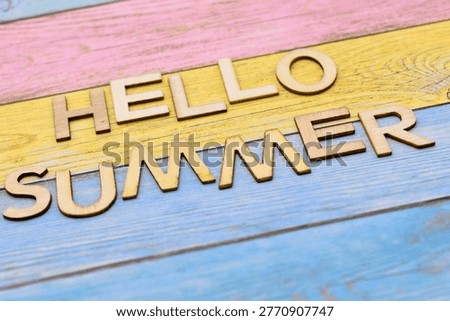 hello summer write on colors background 