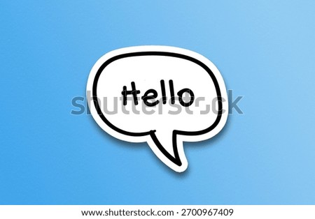 Hello text inside chat bubble on blue background, social interaction concept