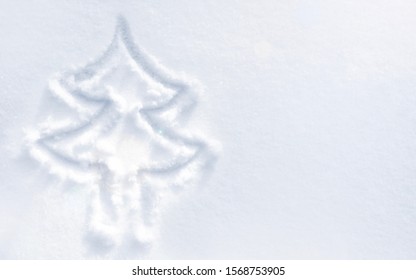Hello Winter Snow Background. Finger drawn Christmas tree on fluffy freshly fallen snow. Top view with copy space - Shutterstock ID 1568753905