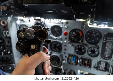 helm of a military helicopter in the pilot's hand. fighter pilot. Inside the attack aircraft.