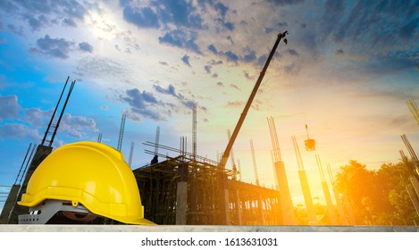 helmet in construction site and construction site worker background, safety first concept