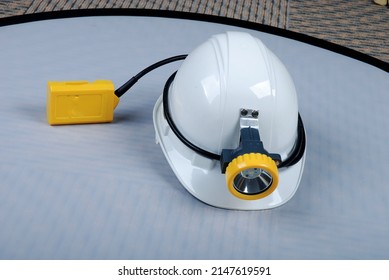 Helmet with a light above it, this helmet is specifically for mining workers who work underground as a light