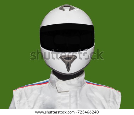 Helmet on the back of a separate machine on a green background.