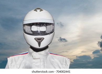 Helmet on the backdrop of a separate machine On the sky background