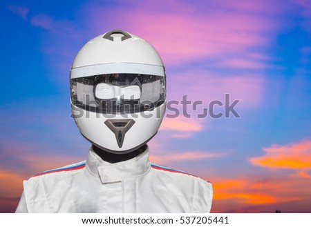 Helmet on the backdrop of a separate machine.