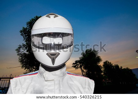Helmet on the backdrop of a separate machine.