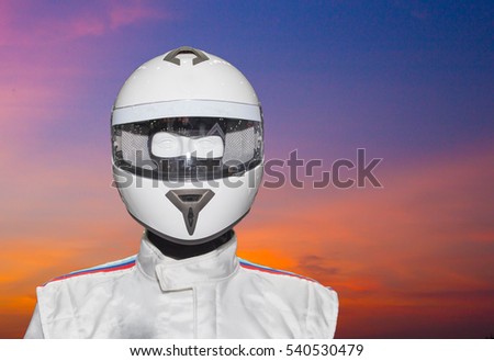 Helmet on the backdrop of a separate machine.