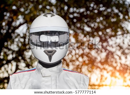 Helmet on the backdrop of a separate machine.