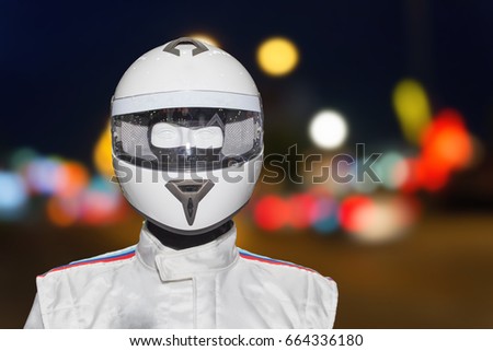 Helmet on the backdrop of a separate machine. a Bokeo background blurred.