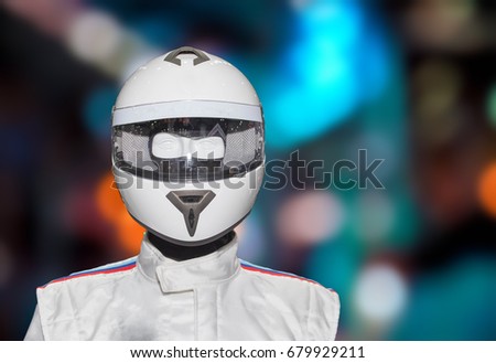 Helmet on the backdrop of a separate machine On the bokeh background