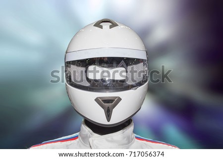 Helmet on the backdrop of a separate machine.