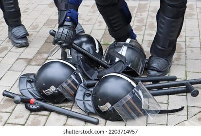 Helmets And Truncheons Of The Police Swat Team