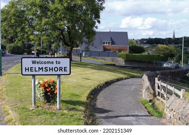 Helmshore Lancashire UK Sept 2022. Welcome To Helmshore Sign. Small Lancashire Village In Rossendale Valley Famous For Its Involvement In The Industrial Revolution Producing Cotton, Wool And Linen.