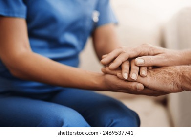 Help, caregiver and senior woman holding hands on sofa for healthcare, consulting or compassion. Lens flare, nurse and elderly patient for hope, trust or medical conversation at retirement home - Powered by Shutterstock