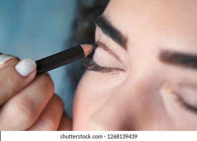 With The Help Of A Cosmetic Pencil, Paint A Thick Line On Your Cut Crease. Beauty And Makeup Concept