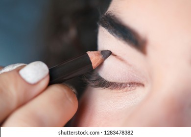 With The Help Of A Cosmetic Pencil, Paint A Thick Line On Your Cut Crease. Beauty And Makeup Concept