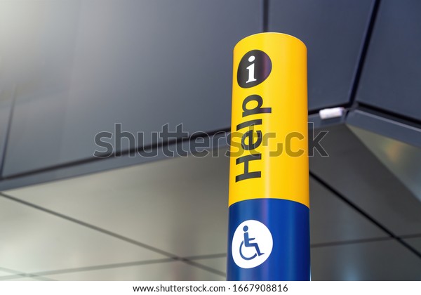 Help desk, meeting\
point, Information sign for disabled person and tourist at the\
international airport.