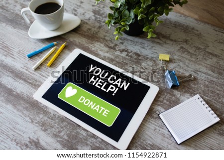 Help and donation button on device screen.