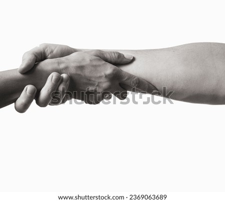 help a friend get through a difficult time. gesture of salvation. support, friendship and rescue concept. holding hands