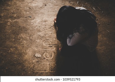 Help Me Sign, Written With Finger On Grunge The Floor Below The Women's Hands. Violence Concept