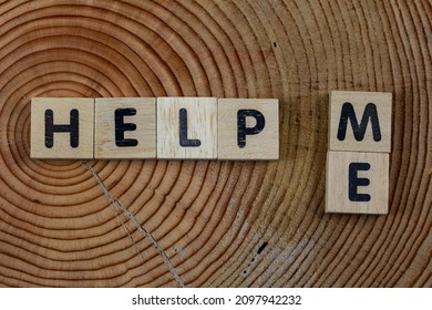 Help me symbol.
Wooden cubes words help me  background. Business, donate, motivational and help me concept.