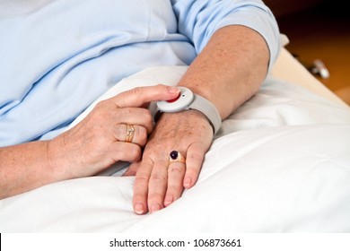 Help A Senior Citizen With Emergency Phone Call In Bed