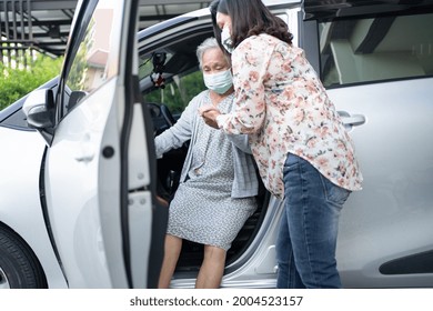 Help And Support Asian Senior Or Elderly Old Lady Woman Patient Sitting On Wheelchair Prepare Get To Her Car, Healthy Strong Medical Concept.