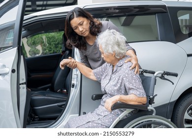 Help And Support Asian Senior Or Elderly Old Lady Woman Patient Sitting On Wheelchair Prepare Get To Her Car, Healthy Strong Medical Concept.