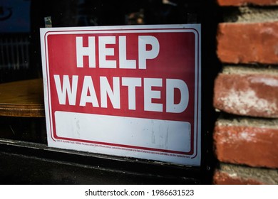 Help Wanted Sign In Business Window Looking For Job Applicants