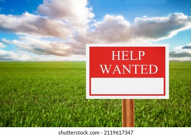 Help Wanted Sign In Farm Field. Farm Labor Shortage, Agriculture Job And Employment Concept