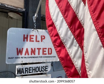 Help Wanted Sign In Front Of A Store In The United States Of America