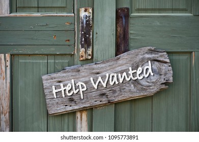 Help Wanted Sign On Old Green Doors.