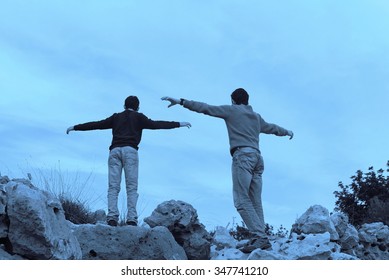 helping hand between two climber