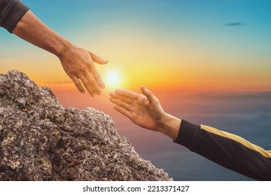 Helping hand concept and international day of peace.Lending a helping hand. People helping each other concept. - Shutterstock ID 2213371427