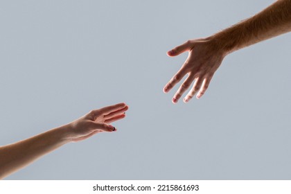 Helping Hand Concept And International Day Of Peace, Support. Helping Hand Outstretched, Isolated Arm, Salvation. Two Hands, Helping Arm Of A Friend, Teamwork.