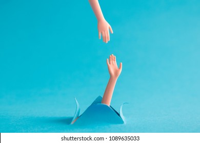 Helping Hand To Drowning Person Minimal Creative Concept.