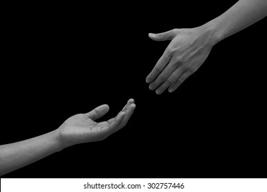 helping hand and hands praying on black dark background concept.