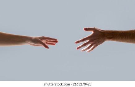 Helping Hand Outstretched, Isolated Arm, Salvation. Close Up Help Hand. Two Hands, Helping Arm Of A Friend, Teamwork. Helping Hand Concept And International Day Of Peace, Support.