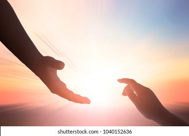 helping hand outstretched for salvation on isolated toned background - Shutterstock ID 1040152636