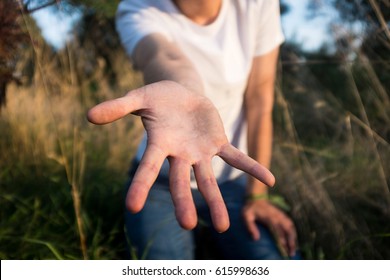 Helping Hand Reaching Out - Shutterstock ID 615998636