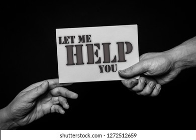 Helping Hands Concept, Person Holding Card Giving To Another In Need 