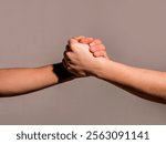 Helping support hand. Support hands. Concept of support. Strong hold. Handshake. Rescue gesture. Support hand. Two hands, helping hand of a friend. Handshake, arms friendship.