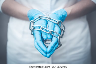 Helpless Doctor. Doctor's Hands Are Tied, The Doctor's Hands Are Chains. Concept Impossibility Of Treatment.