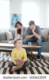 Helpless Parents And Their Badly Behaving Son At Home