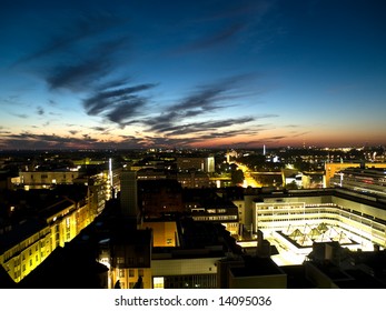 Helsinki Business Downtown At Night With Bright Sky