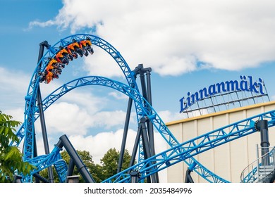 Helsinki, Finland - 23 July 2021: Linnanmaki Amusement Park, new roller coaster Taiga in motion