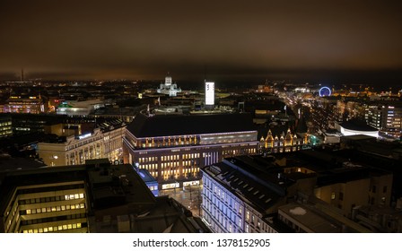 Helsinki, Finland - February 18, 2019: Aerial Panorama Of Downtown. Old And Modern Buildings In Center Of City Illuminated In The Night