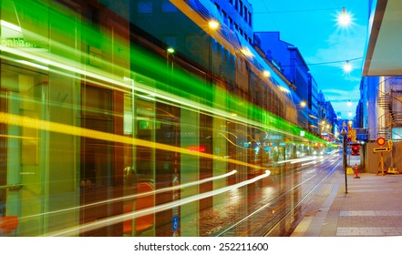 HELSINKI, FINLAND - JULY 27, 2014:  Tram Departs From A Stop On Street Aleksanterinkatu In Helsinki