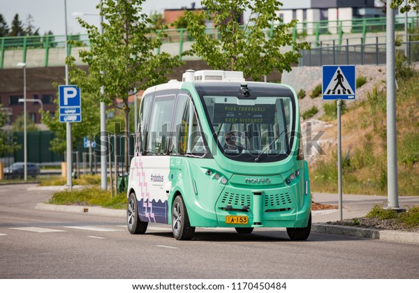 HELSINKI,\
FINLAND - JUNE 11, 2018: Automated remotely operated bus test in\
Helsinki. Unmanned public transport on\
street.